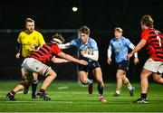 6 December 2024; Luke McGill of UCD in action against Garvan Woodcock of Dublin University during the Bank of Ireland JP Fanagan Premier League 1 match between UCD and Dublin University at UCD in Dublin. Photo by Piaras Ó Mídheach/Sportsfile