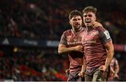 7 December 2024; Alex Kendellen of Munster, right, celebrates with team-mate Diarmuid Barron after scoring his side's third try during the Champions Cup Round 1 match between Munster and Stade Francais Paris at Thomond Park in Limerick. Photo by Seb Daly/Sportsfile