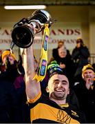 8 December 2024; Dr Crokes captain David Naughton lifts the cup after his side's victory in the AIB Munster GAA Senior Club Football Championship final match between Dr Crokes of Kerry and Loughmore Castleiney of Tipperary at Mallow GAA Grounds in Cork. Photo by Piaras Ó Mídheach/Sportsfile