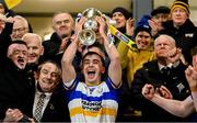 8 December 2024; Errigal Ciarán captain Darragh Canavan lifts the Seamus McFerran Cup after the AIB Ulster GAA Senior Club Football Championship final match between Errigal Ciarán of Tyrone and Kilcoo of Down at BOX-IT Athletic Grounds in Armagh. Photo by Ramsey Cardy/Sportsfile