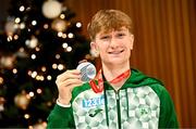 9 December 2024; U23 European men's cross country silver medalist Nick Griggs at Dublin Airport during the Irish cross country teams return home from the SPAR European Cross Country Championships 2024 in Antalya, Turkiye. Photo by Ramsey Cardy/Sportsfile