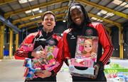 11 December 2024; Bohemian FC players Liam Smith, left, and Divin Ismala during the Bohemian FC Direct Provision Christmas Gift Drive at RDS Simmonscourt in Ballsbridge, Dublin. Photo by Shauna Clinton/Sportsfile