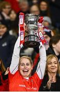 14 December 2024; Kilkerrin-Clonberne Sarah Gormally lifts the Dolores Tyrrell Memorial Cup after her side's victory in the AIB LGFA All-Ireland Senior Club Championship final match between Kilmacud Crokes and Kilkerrin-Clonberne at Croke Park in Dublin.Photo by Piaras Ó Mídheach/Sportsfile