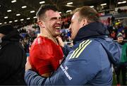 20 December 2024; Munster attack coach Mike Prendergast, right, celebrates with Tom Farrell of Munster after the United Rugby Championship match between Ulster and Munster at Kingspan Stadium in Belfast. Photo by Ramsey Cardy/Sportsfile