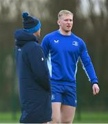 23 December 2024; Jamie Osborne in conversation with Leinster senior coach Jacques Nienaber during a Leinster Rugby squad training session at UCD in Dublin. Photo by Shauna Clinton/Sportsfile