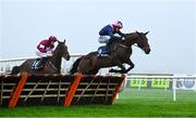 26 December 2024; Kopek Des Bordes, with Patrick Mullins up, right, jumps on the last on his way to winning The TRI Equestrian Maiden Hurdle on day one of the Leopardstown Christmas Festival at Leopardstown Racecourse in Dublin. Photo by Shauna Clinton/Sportsfile