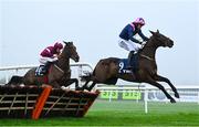 26 December 2024; Kopek Des Bordes, with Patrick Mullins up, right, clears the last on his way to winning The TRI Equestrian Maiden Hurdle on day one of the Leopardstown Christmas Festival at Leopardstown Racecourse in Dublin. Photo by Shauna Clinton/Sportsfile