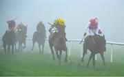 26 December 2024; Hello Neighbour, with Keith Donoghue  up, right, on the way to winning The O`Driscolls Irish Whiskey Juvenile Hurdle race on day one of the Leopardstown Christmas Festival at Leopardstown Racecourse in Dublin. Photo by Shauna Clinton/Sportsfile