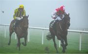 26 December 2024; Hello Neighbour, with Keith Donoghue  up, right, on the way to winning The O`Driscolls Irish Whiskey Juvenile Hurdle race on day one of the Leopardstown Christmas Festival at Leopardstown Racecourse in Dublin. Photo by Shauna Clinton/Sportsfile