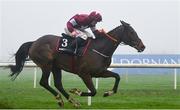 26 December 2024; Croke Park, with Sam Ewing up, crosses the finish line to win The Racing Post Long Distance Novice Steeplechase race on day one of the Leopardstown Christmas Festival at Leopardstown Racecourse in Dublin. Photo by Shauna Clinton/Sportsfile