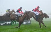 26 December 2024; The eventual winner An Peann Dearg, with Sean O'Keeffe up, hidden on the rails, trails The Folkes Tiara, 6, with Ethan Michael O'Sullivan up, and The King Of Prs, with, Keith Donoghue up, left, on their way to win The Racing Post Handicap Steeplechase race on day one of the Leopardstown Christmas Festival at Leopardstown Racecourse in Dublin. Photo by Shauna Clinton/Sportsfile