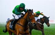 26 December 2024; Green Splendour, with Patrick Mullins up, left, races past Khmer, with Robert James, up, on the way to winning The Race And Stay Flat Race on day one of the Leopardstown Christmas Festival at Leopardstown Racecourse in Dublin. Photo by Shauna Clinton/Sportsfile