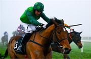 26 December 2024; Green Splendour, with Patrick Mullins up, left, races past Khmer, with Robert James, up, on the way to winning The Race And Stay Flat Race on day one of the Leopardstown Christmas Festival at Leopardstown Racecourse in Dublin. Photo by Shauna Clinton/Sportsfile