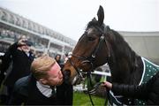 27 December 2024; Owner Neil Sands kisses Solness after sending him out to win the Paddy's Rewards Club Steeplechase (Grade 1) 5-y-o plus on day two of the Leopardstown Christmas Festival at Leopardstown Racecourse in Dublin. Photo by David Fitzgerald/Sportsfile