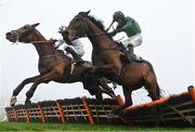 27 December 2024; Eastern Legend, left, with Keith Donoghue up, and Karafon, with Daryl Jacob up, jump the last in the Paddy Power Future Champions Novice Hdle (Grade 1) 4-y-o plus on day two of the Leopardstown Christmas Festival at Leopardstown Racecourse in Dublin. Photo by David Fitzgerald/Sportsfile