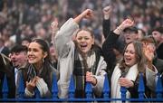 27 December 2024; A racegoer celebrates while watching the Spinal Injuries Ireland Handicap Hurdle 4-y-o plus on day two of the Leopardstown Christmas Festival at Leopardstown Racecourse in Dublin. Photo by David Fitzgerald/Sportsfile