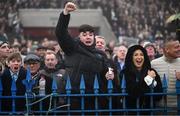 27 December 2024; A racegoer celebrates while watching the Spinal Injuries Ireland Handicap Hurdle 4-y-o plus on day two of the Leopardstown Christmas Festival at Leopardstown Racecourse in Dublin. Photo by David Fitzgerald/Sportsfile