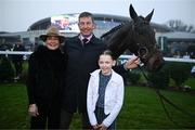 27 December 2024; Trainer Gavin Cromwell celebrates with his wife Kiva, left, and daughter Sophie, age 11, after sending Perceval Legallois, right, to win the Paddy Power Steeple chase 5-y-o plus on day two of the Leopardstown Christmas Festival at Leopardstown Racecourse in Dublin. Photo by David Fitzgerald/Sportsfile