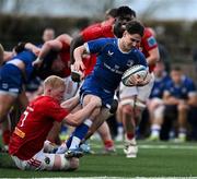 27 December 2024; Páidí Farrell of Leinster A is tackled by Des Fitzgerald of Munster A during the A Interprovincial Rugby Championship match between Munster A and Leinster A at New Ormond Park in Nenagh, Tipperary. Photo by Brendan Moran/Sportsfile