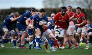 27 December 2024; Páidí Farrell of Leinster A is tackled by Des Fitzgerald of Munster A during the A Interprovincial Rugby Championship match between Munster A and Leinster A at New Ormond Park in Nenagh, Tipperary. Photo by Brendan Moran/Sportsfile