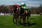 28 December 2024; Kaid D'authie, with Mark Walsh up, right, races ahead of Koktail Divin, with Rachael Blackmore up, to win the Savills Maiden Hurdle on day three of the Leopardstown Christmas Festival at Leopardstown Racecourse in Dublin. Photo by David Fitzgerald/Sportsfile