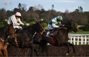 28 December 2024; Dee Capo, with Danny Gilligan up, right, jump the last ahead of Chapeau De Soleil, with Sean O'Keeffe up, on their way to winning the Ballymaloe Relish Beginners Steeplechase on day three of the Leopardstown Christmas Festival at Leopardstown Racecourse in Dublin. Photo by David Fitzgerald/Sportsfile