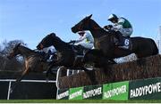 28 December 2024; Dee Capo, with Danny Gilligan up, right, jump the last ahead of Chapeau De Soleil, with Sean O'Keeffe up, on their way to winning the Ballymaloe Relish Beginners Steeplechase on day three of the Leopardstown Christmas Festival at Leopardstown Racecourse in Dublin. Photo by David Fitzgerald/Sportsfile