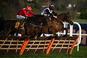 28 December 2024; Home By The Lee, left, with J J Slevin up, jumps the last alongside Bob Olinger, with Rachael Blackmore up, on their way to winning the Savills Hurdle (Grade 1) 4-y-o plus on day three of the Leopardstown Christmas Festival at Leopardstown Racecourse in Dublin. Photo by David Fitzgerald/Sportsfile