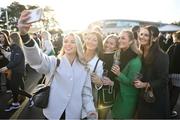 28 December 2024; Racegoers take a 'selfie' with their smartphone on day three of the Leopardstown Christmas Festival at Leopardstown Racecourse in Dublin. Photo by David Fitzgerald/Sportsfile