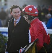 28 December 2024; Trainer Joseph O'Brien in conversation with jockey J J Slevin after sending Home By The Lee out to win the Savills Hurdle (Grade 1) 4-y-o plus on day three of the Leopardstown Christmas Festival at Leopardstown Racecourse in Dublin. Photo by David Fitzgerald/Sportsfile