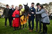 28 December 2024; Galopin Des Champs, centre, with jockey Paul Townend, winning connections, and trainer Willie Mullins, after they won the Savills Steeplechase (Grade 1) 5-y-o plus  on day three of the Leopardstown Christmas Festival at Leopardstown Racecourse in Dublin. Photo by David Fitzgerald/Sportsfile