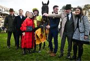 28 December 2024; Galopin Des Champs, centre, with jockey Paul Townend, winning connections, and trainer Willie Mullins, after they won the Savills Steeplechase (Grade 1) 5-y-o plus  on day three of the Leopardstown Christmas Festival at Leopardstown Racecourse in Dublin. Photo by David Fitzgerald/Sportsfile