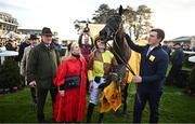 28 December 2024; Galopin Des Champs, second from right, with jockey Paul Townend, owners Audrey and Greg Turley, trainer Willie Mullins and groom Adam Connolly after they won the Savills Steeplechase (Grade 1) 5-y-o plus  on day three of the Leopardstown Christmas Festival at Leopardstown Racecourse in Dublin. Photo by David Fitzgerald/Sportsfile