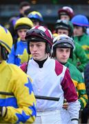 29 December 2024; Jockey Carl Patrick Millar, centre, makes his way to the parade ring before competing on Maxxum in the Neville Hotels Premier Handicap Hurdle on day four of the Leopardstown Christmas Festival at Leopardstown Racecourse in Dublin. Photo by Shauna Clinton/Sportsfile