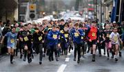 1 January 2025; Participants during the 45th annual Castlecomer Wellie Race in Castlecomer, Kilkenny, ran in aid of a number of local and national charities. Originally started in 1978, the local men decided to run off the Christmas excess by having a race over a cross country circuit. Not being the type of men that would be seen in a pair of proper running shoes, let alone actually own a pair, the most obvious footwear for this type of event was wellingtons. The event also includes a parade and family entertainment throughout the day in Castlecomer. Photo by David Fitzgerald/Sportsfile