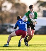 2 January 2025; Sam Bolger of South East is tackled by Cillian James of North Midlands during the BearingPoint Shane Horgan Cup Round 3 match between South East and North Midlands at Shay Murtagh Park in Mullingar, Westmeath. Photo by Ben McShane/Sportsfile