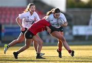 2 January 2025; Eimear Doonan of Midlands is tackled by Anna Cosgrove of North East during the BearingPoint Sarah Robinson Cup Round 3 match between Midlands and North East at Shay Murtagh Park in Mullingar, Westmeath. Photo by Ben McShane/Sportsfile