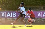 2 January 2025; Diana Izekor of Midlands runs in to score her side's second try despite the tackle of Milita Valeryte of North East during the BearingPoint Sarah Robinson Cup Round 3 match between Midlands and North East at Shay Murtagh Park in Mullingar, Westmeath. Photo by Ben McShane/Sportsfile