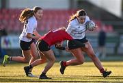 2 January 2025; Eimear Doonan of Midlands is tackled by Anna Cosgrove of North East during the BearingPoint Sarah Robinson Cup Round 3 match between Midlands and North East at Shay Murtagh Park in Mullingar, Westmeath. Photo by Ben McShane/Sportsfile