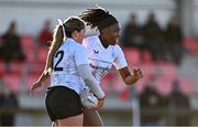 2 January 2025; Sophie McDonagh of Midlands celebrates with teammate Diana Izekor, right, after scoring their side's first try during the BearingPoint Sarah Robinson Cup Round 3 match between Midlands and North East at Shay Murtagh Park in Mullingar, Westmeath. Photo by Ben McShane/Sportsfile