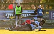 2 January 2025; Diana Izekor of Midlands scores her side's second try despite the tackle of Milita Valeryte of North East during the BearingPoint Sarah Robinson Cup Round 3 match between Midlands and North East at Shay Murtagh Park in Mullingar, Westmeath. Photo by Ben McShane/Sportsfile