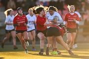 2 January 2025; Sophie McDonagh of Midlands is tackled by Emma O'Rourke, left, and Anna Allison of North East during the BearingPoint Sarah Robinson Cup Round 3 match between Midlands and North East at Shay Murtagh Park in Mullingar, Westmeath. Photo by Ben McShane/Sportsfile