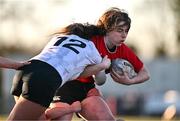 2 January 2025; Emma O'Rourke of North East is tackled by Sophie McDonagh of Midlands during the BearingPoint Sarah Robinson Cup Round 3 match between Midlands and North East at Shay Murtagh Park in Mullingar, Westmeath. Photo by Ben McShane/Sportsfile