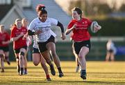 2 January 2025; Emma O'Rourke of North East makes a break, despite the attention of Ruby Osuma of Midlands, during the BearingPoint Sarah Robinson Cup Round 3 match between Midlands and North East at Shay Murtagh Park in Mullingar, Westmeath. Photo by Ben McShane/Sportsfile