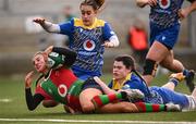 4 January 2025; Emily Lane of Clovers scores her side's first try despite the tackle of Lily Terry of Gwalia Lightning during the Celtic Challenge match between Clovers and Gwalia Lightning at Kingspan Stadium in Belfast. Photo by Ramsey Cardy/Sportsfile