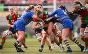 4 January 2025; Anna McGann of Clovers is tackled by Molly Reardon, left, and Caitlin Lewis of Gwalia Lightning during the Celtic Challenge match between Clovers and Gwalia Lightning at Kingspan Stadium in Belfast. Photo by Ramsey Cardy/Sportsfile