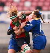 4 January 2025; Ruth Campbell of Clovers is tackled by Carys Williams-Morris and Caitlin Lewis of Gwalia Lightning during the Celtic Challenge match between Clovers and Gwalia Lightning at Kingspan Stadium in Belfast. Photo by Ramsey Cardy/Sportsfile