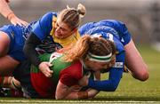 4 January 2025; Ruth Campbell of Clovers is tackled by Carys Williams-Morris and Caitlin Lewis of Gwalia Lightning during the Celtic Challenge match between Clovers and Gwalia Lightning at Kingspan Stadium in Belfast. Photo by Ramsey Cardy/Sportsfile