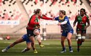 4 January 2025; Alanna McInerney of Clovers is tackled by Nia Grundy, left, and Molly Anderson-Thomas of Gwalia Lightning during the Celtic Challenge match between Clovers and Gwalia Lightning at Kingspan Stadium in Belfast. Photo by Ramsey Cardy/Sportsfile