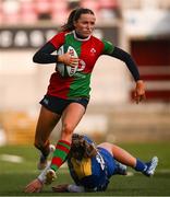 4 January 2025; Hannah Clarke of Clovers evades the tackle of Molly Anderson-Thomas of Gwalia Lightning during the Celtic Challenge match between Clovers and Gwalia Lightning at Kingspan Stadium in Belfast. Photo by Ramsey Cardy/Sportsfile